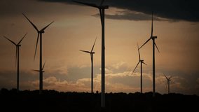 Wind turbines with global energy network and data map overlay. Concept of renewable energy grid, smart power system, and global electricity generation analysis. - Powered by Shutterstock - Get 15% off with code: PIKWIZARD15