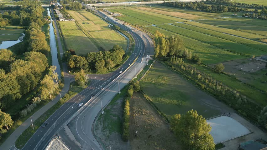 High drone shot showing new highway development in Leiden, Netherlands, connecting the city to the main road network.
