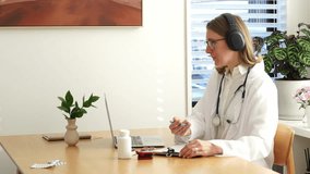 Focused healthcare professional analyzing data with wireless headphones in modern office setting - Powered by Shutterstock - Get 15% off with code: PIKWIZARD15