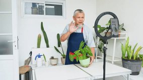 Gardeners show their plants to viewers on social media during live streams - Powered by Shutterstock - Get 15% off with code: PIKWIZARD15