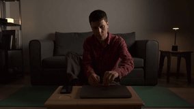 Evening meditation at home after work, young man practicing mindfulness for stress relief - Powered by Shutterstock - Get 15% off with code: PIKWIZARD15