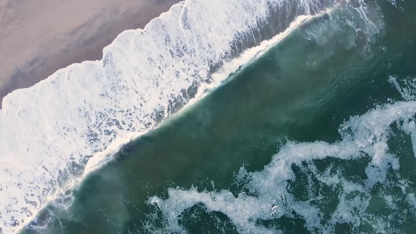 The rhythmic lines of ocean waves rolling to the shore, Natural Pattern