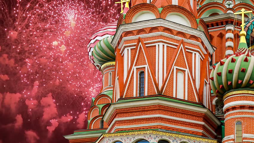 Temple of Basil the Blessed and fireworks in honor of Victory Day celebration (WWII), Red Square, Moscow, Russia. Time lapse, with zoom