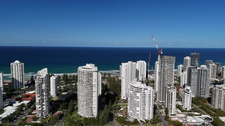 Gold Coast, Queensland, Australia, Sep 5, 2025: 4K Aerial Drone Footage featuring City Skyline, Surfers Paradise Towers, Apartments, Golden Main Beaches, Luxury Homes, and the Pacific Ocean Coastline.