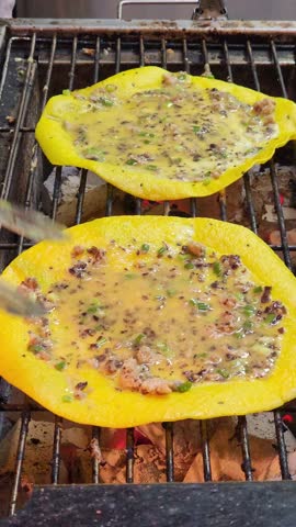 A series of video clips showing a chef making and serving Banh Trang Nuong, a Vietnamese street food, at a 5-star resort buffet. The footage captures the delicious cooking process.
