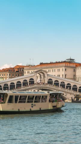 Venice, Italy - July 13, 2017: time lapse of city skyline at Rialto Bridge and Venezia Grand Canal (Vertical)