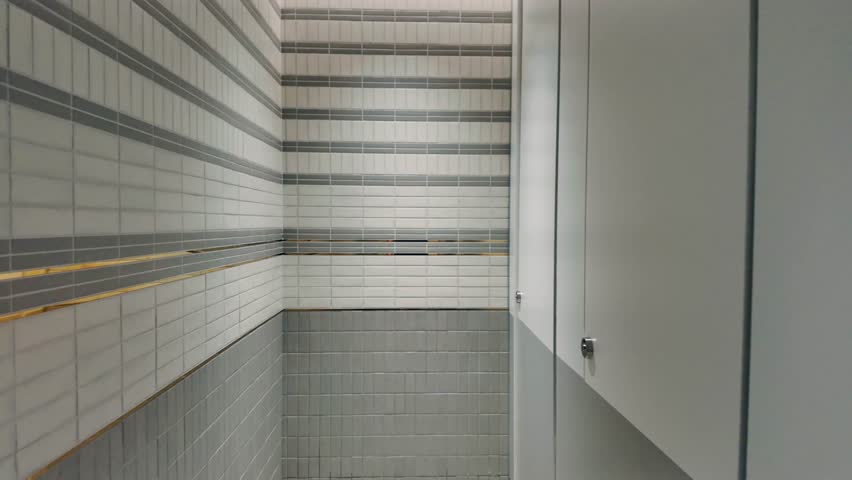 perspective of modern corridor with sleek door, contemporary design and elegant space, viewpoint of stylish hallway with minimalist entrances, futuristic architecture and clean ambiance 4k