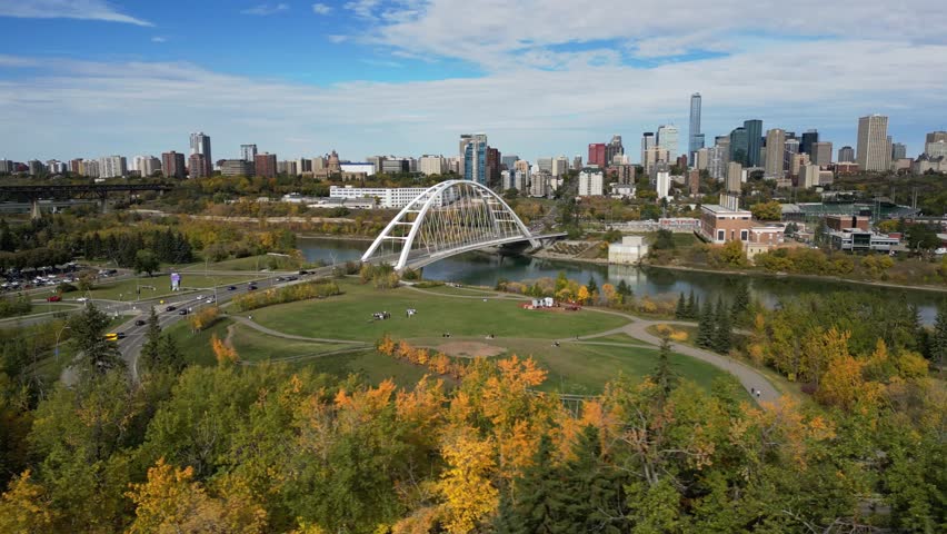 Aerial view of downtown Edmonton, Alberta, Canada, showcasing modern skyscrapers, office towers, and busy city streets on a  fall day. Perfect for business, travel, architecture, and urban lifestyle.