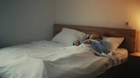 Upset elderly man missing his family while lying in bed, loneliness at old age - Powered by Shutterstock - Get 15% off with code: PIKWIZARD15