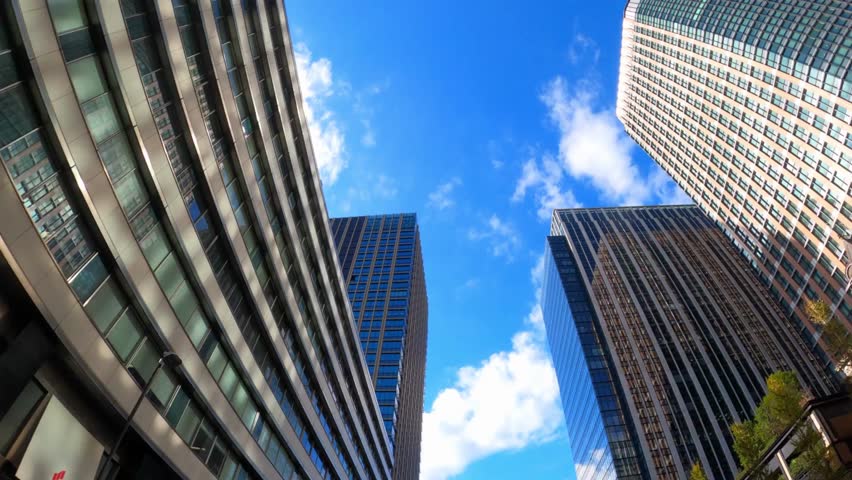 modern skyscraper Business Office Buildings with Glass Reflection. Time lapse financial center city