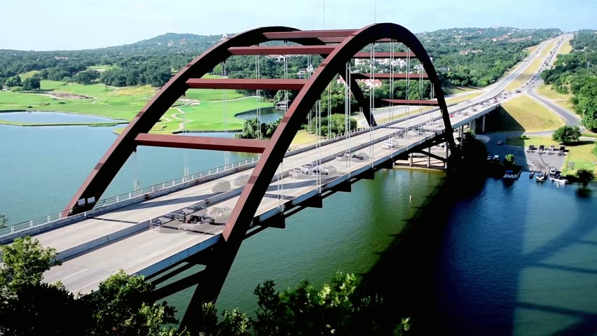 Pennybacker bridge over the colorado river in austin, texas on a sunny day