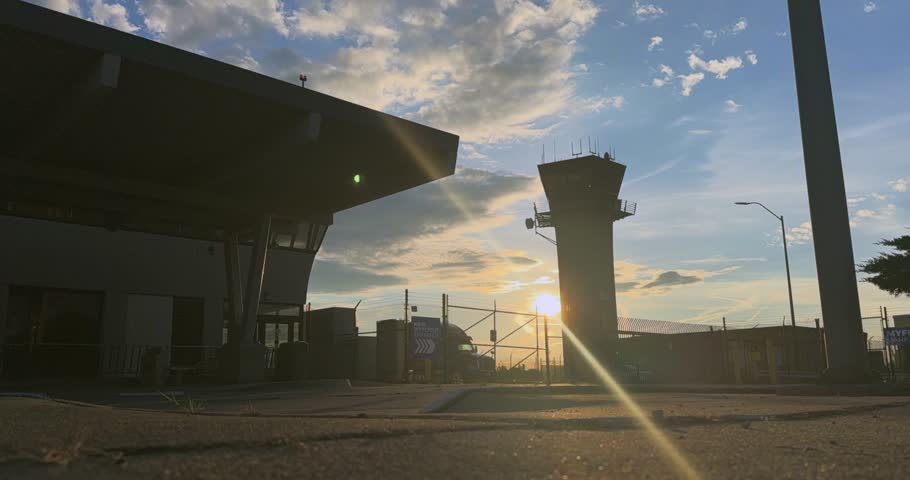 Establishing Time lapse of Detroit City Airport Control Tower at Sunset