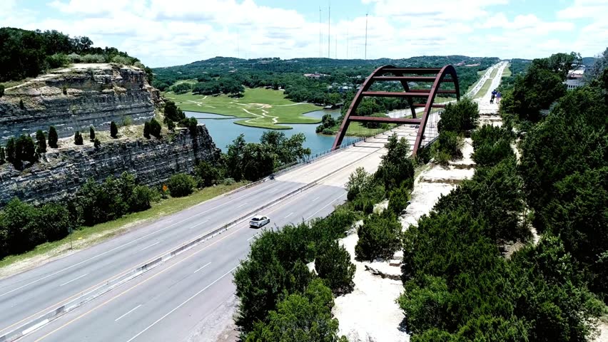 Aerial view of the pennybacker bridge over the colorado river in austin, texas