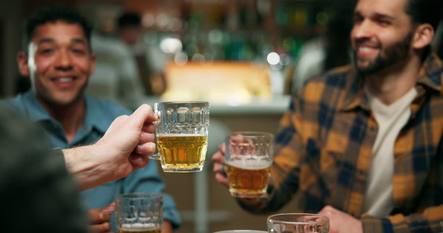 Hands, cheers and men with beer in pub, friends or celebration for social gathering, laugh and night. People, together and hangout with drinks in bar, evening and toast with alcohol, happy and break