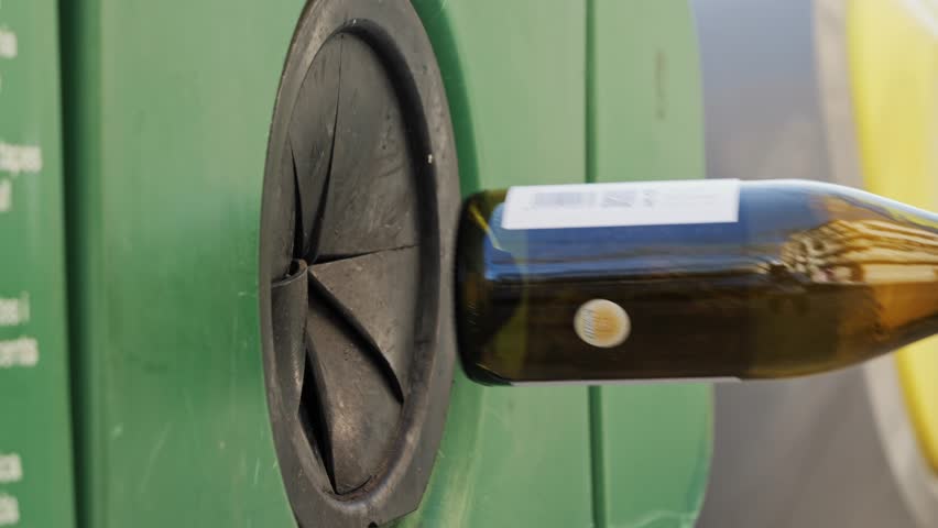 Concept of waste sorting, recycling, and reuse, separate garbage disposal, environmental protection. Glass recycling. High quality 4k footage