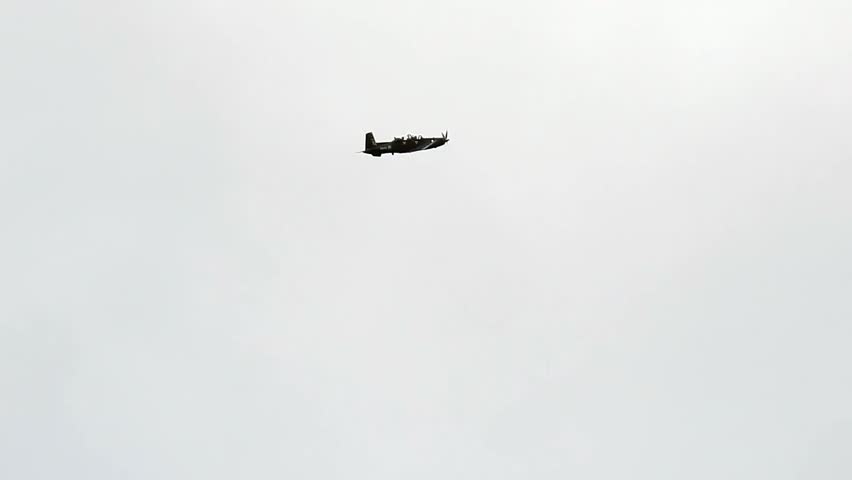 Texan T1 flight training aircraft flying over RAF Valley in North Wales, UK