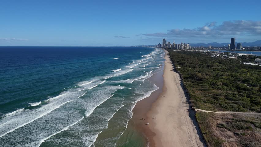 Main Beach, Gold Coast, Queensland, Australia: 4K Aerial Drone Footage of Federation Walk Coastal Reserve, Beaches, Australia Coast, Pacific Ocean Waves, City Skylines Along Australian Coastline
