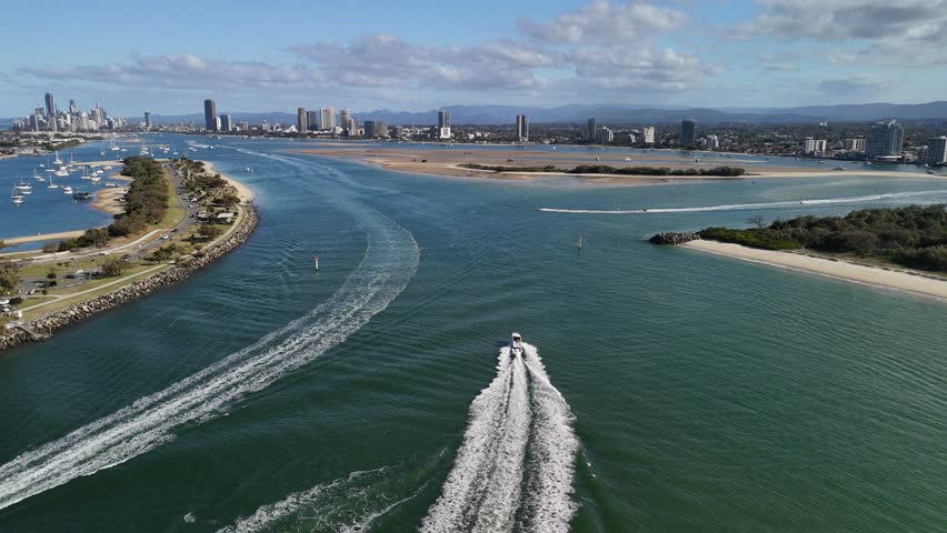 Gold Coast, Queensland, Australia: 4K Aerial Drone Footage of Wave Break Island, Main Beache, Coastline, Sandy Strip, Coastal Reserve, Waterway, Seaway, Sail Boats on River, City Skylines