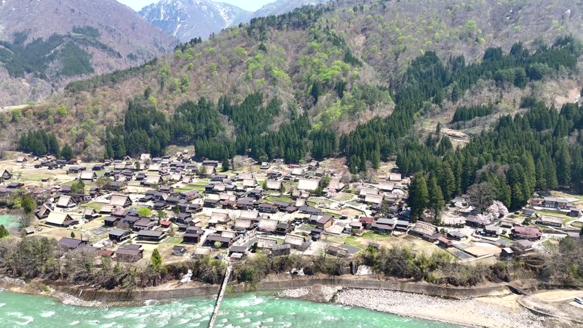 Shirakawago, Japan, Aerial. Whole village with river