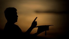 Silhouette man pointing at AI learning digital dashboard with graphs, charts and world map, concept of education technology, data visualization, smart learning and artificial intelligence. - Powered by Shutterstock - Get 15% off with code: PIKWIZARD15