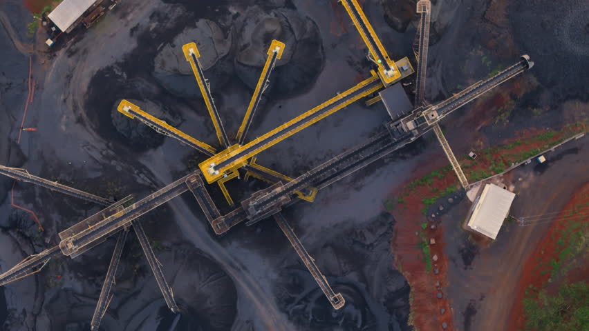 Conveyor Belts Transporting Minerals in Open Pit Quarry