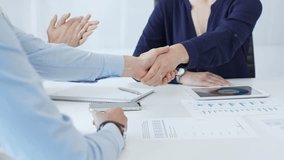 Business executives shaking hands, colleagues clapping after sealing significant partnership, expressing professional success and collaborative achievement in corporate environment. Handshake close up - Powered by Shutterstock - Get 15% off with code: PIKWIZARD15