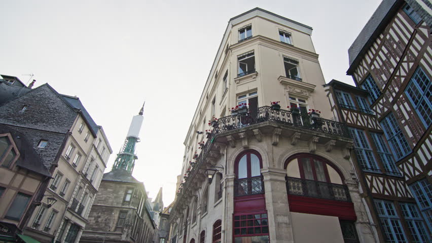 Beautiful architecture of historic buildings on the streets of Rouen France facades of tourist houses and European cityscape travel and tourism.