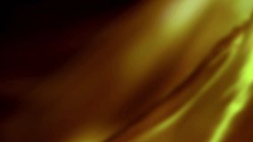 A smooth flowing abstract background with golden yellow and brown light waves. The soft motion creates an elegant and luxurious atmosphere, ideal for video overlays, presentations, and projector.  - Powered by Shutterstock - Get 15% off with code: PIKWIZARD15