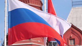 Russian flag waving in the wind in Moscow. - Powered by Shutterstock - Get 15% off with code: PIKWIZARD15
