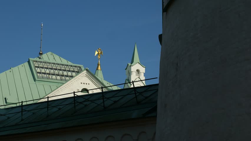 Double-headed eagle on the spire of the tower of Ratnaya Palata - Russia's World War I museum in the Alexander Park of Tsarskoye Selo, Pushkin, Russia