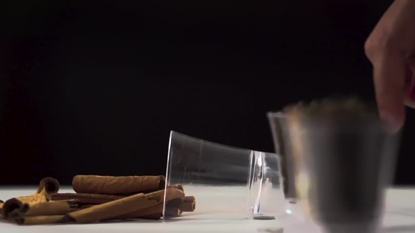 Stylise shot of whole spices on black background. Cinematic Food stock footage.