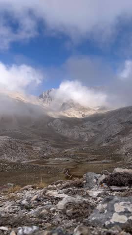 Highlands with Mountains and Passing Clouds