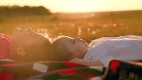 Happy children girls lying on grass summer. Children friendship. Family picnic in nature park. Happy smiles of children on green grass. Healthy rest of children in nature. Family weekend on sunny lawn - Powered by Shutterstock - Get 15% off with code: PIKWIZARD15