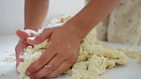 A young child joyfully molds and shapes colorful dough, truly showcasing their creativity during fun baking activities. slow motion - Powered by Shutterstock - Get 15% off with code: PIKWIZARD15