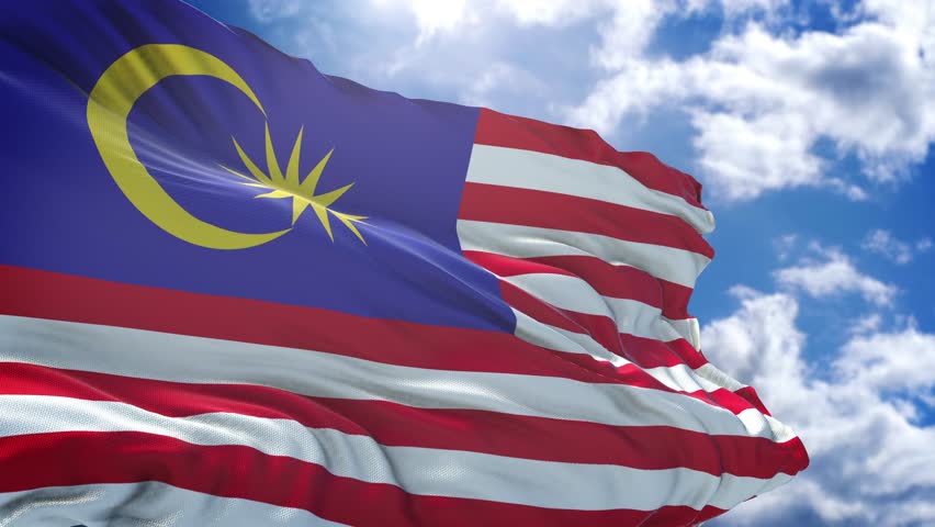 Malaysian flag. Close-up of the Malaysian flag waving in the wind. Malaysian flag circle.
