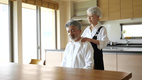 Wife giving her husband a shoulder massage - Powered by Shutterstock - Get 15% off with code: PIKWIZARD15
