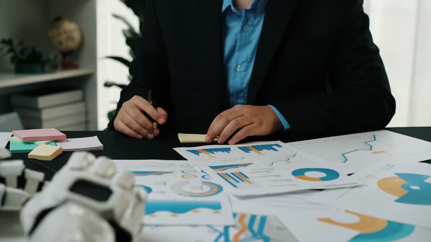 Business professionals utilize AI data analytics, exploring market trends collaboratively to refine strategic goals and enhance marketing effectiveness. Noogenesis AI - Powered by Shutterstock - Get 15% off with code: PIKWIZARD15