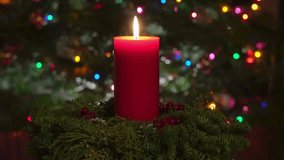 Romantic festive Christmas holiday evening. lit  candles on indoor Advent wreath. Romantic festive candlelight with tranquil bokeh lights and dark copy space. Looped 3D animation background. - Powered by Shutterstock - Get 15% off with code: PIKWIZARD15