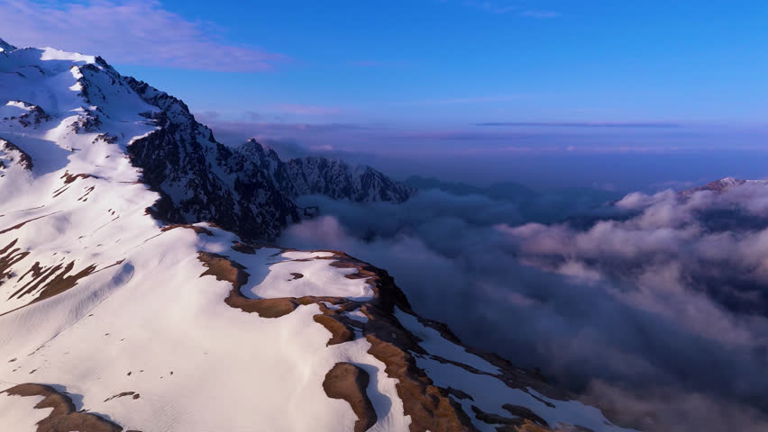 Heaven in Motion – Sar Pass Summit Covered in Clouds