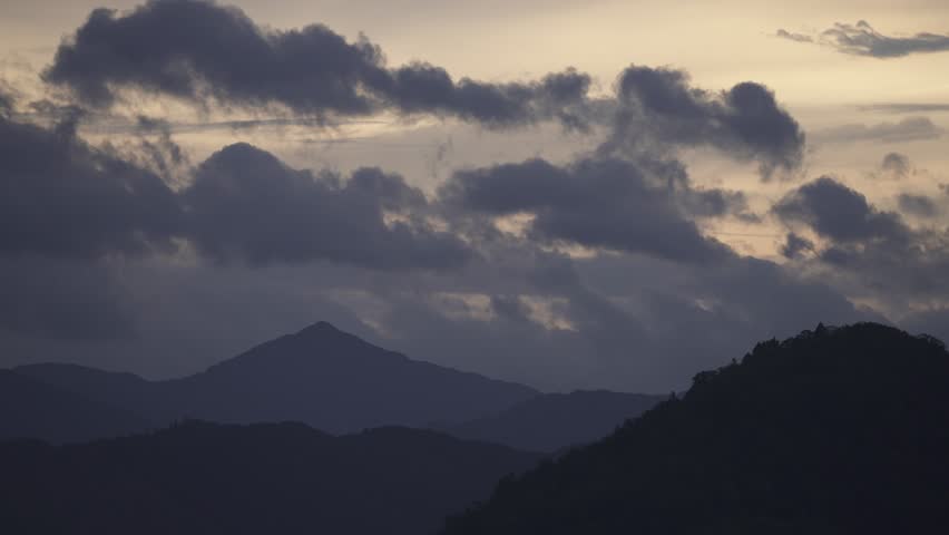 Rain clouds hanging over the morning mountains of Tottori Prefecture