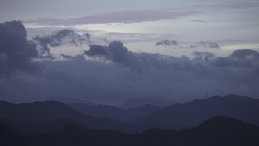 Rain clouds hanging over the morning mountains of Tottori Prefecture