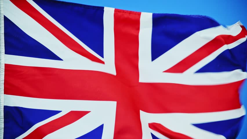 British flag waving on blue background