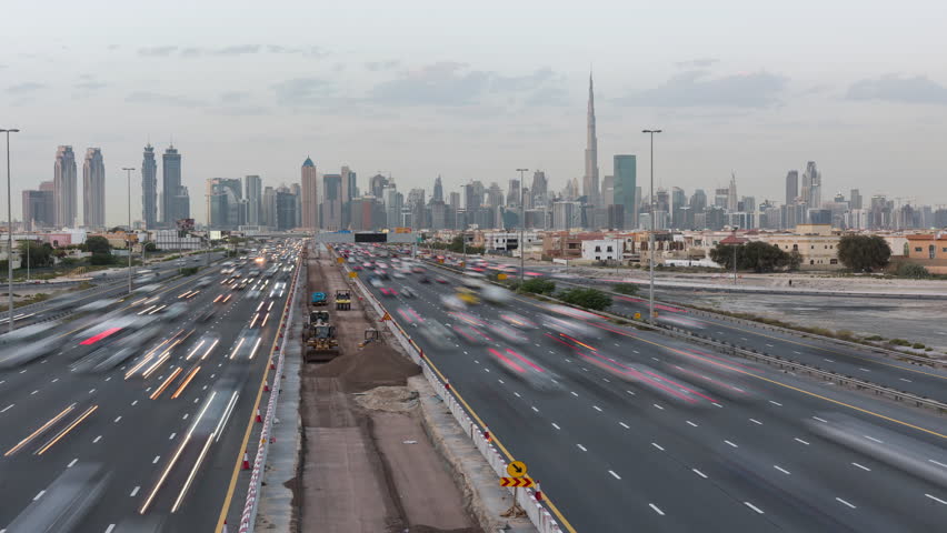 Day to Night Timelapse of Dubai Skyline Skyscrapers with Rush Hour Traffic