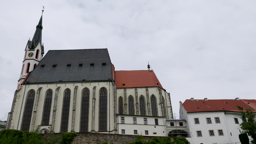 Historical church architecture of Kostel Svateho Vita in the quiet town Cesky Krumlov showcasing gothic design and serene atmosphere