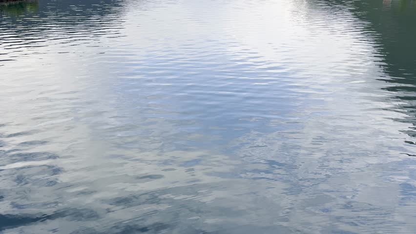 Majestic Norwegian fjords captured from a boat, from the road, and from above, under sun and rain.