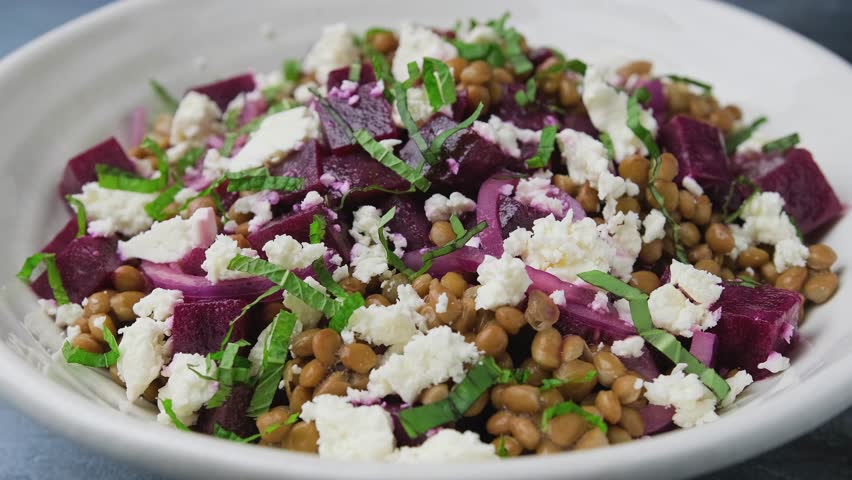 Eating Beetroot Feta Cheese Lentil Salad. Healthy Food