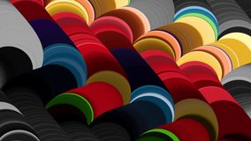 Cycled 3d animation. Abstract geometric pattern with overlapping colorful circles on a gray background, arranged in diagonal rows, creating a tube-like illusion with segmented colors. Hypnotic intro - Powered by Shutterstock - Get 15% off with code: PIKWIZARD15