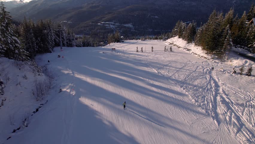 Skier snowboarder downhill ski mountain, Whistler mountain, snow, ski, winter sport, sunset. 4 24FPS