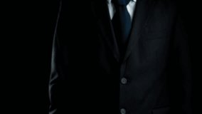 A businessman in a suit extends his hand, showcasing a futuristic rocket icon surrounded by digital charts. This image symbolizes growth, innovation, and technology in business. Qubit - Powered by Shutterstock - Get 15% off with code: PIKWIZARD15