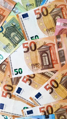 Paper money, euro notes, cash for savings, investments and business transactions. Euro paper cash as a financial background for your design